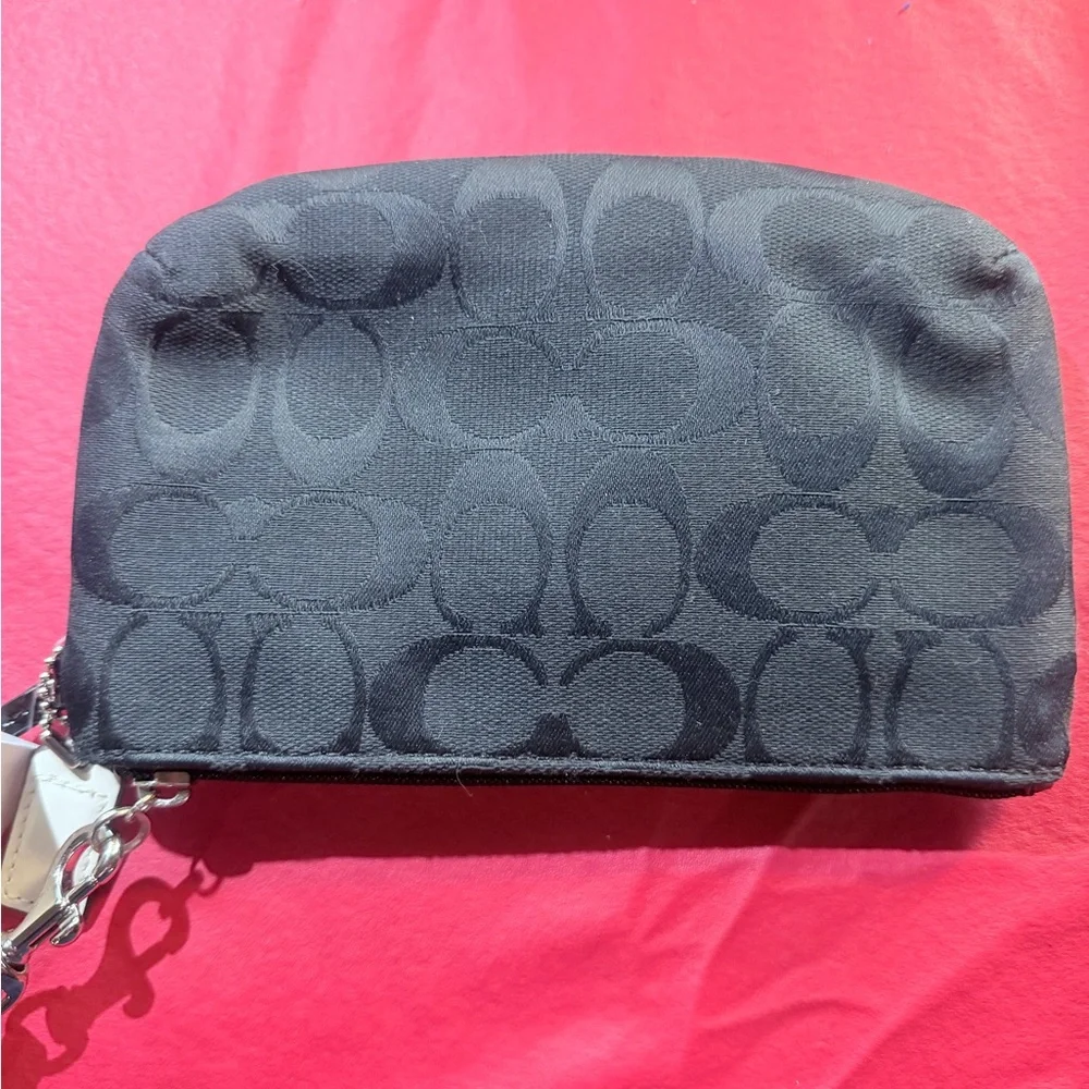 Coach Park Signature Medium Wristlet. PRK SIG MED WRST," which stands for Park - Picture 4 of 4